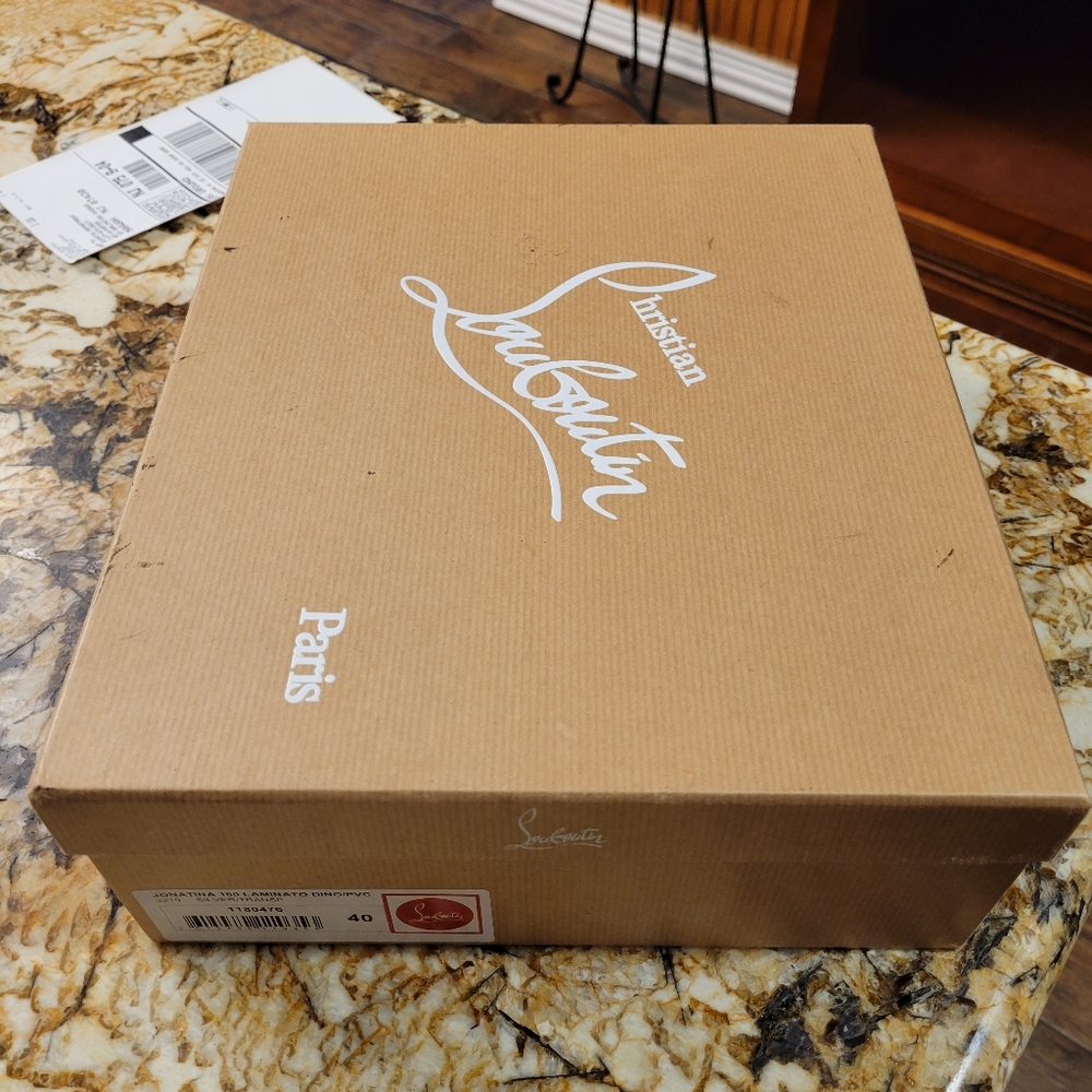 Gently worn Christian Louboutin /Jonatina Laminato heels